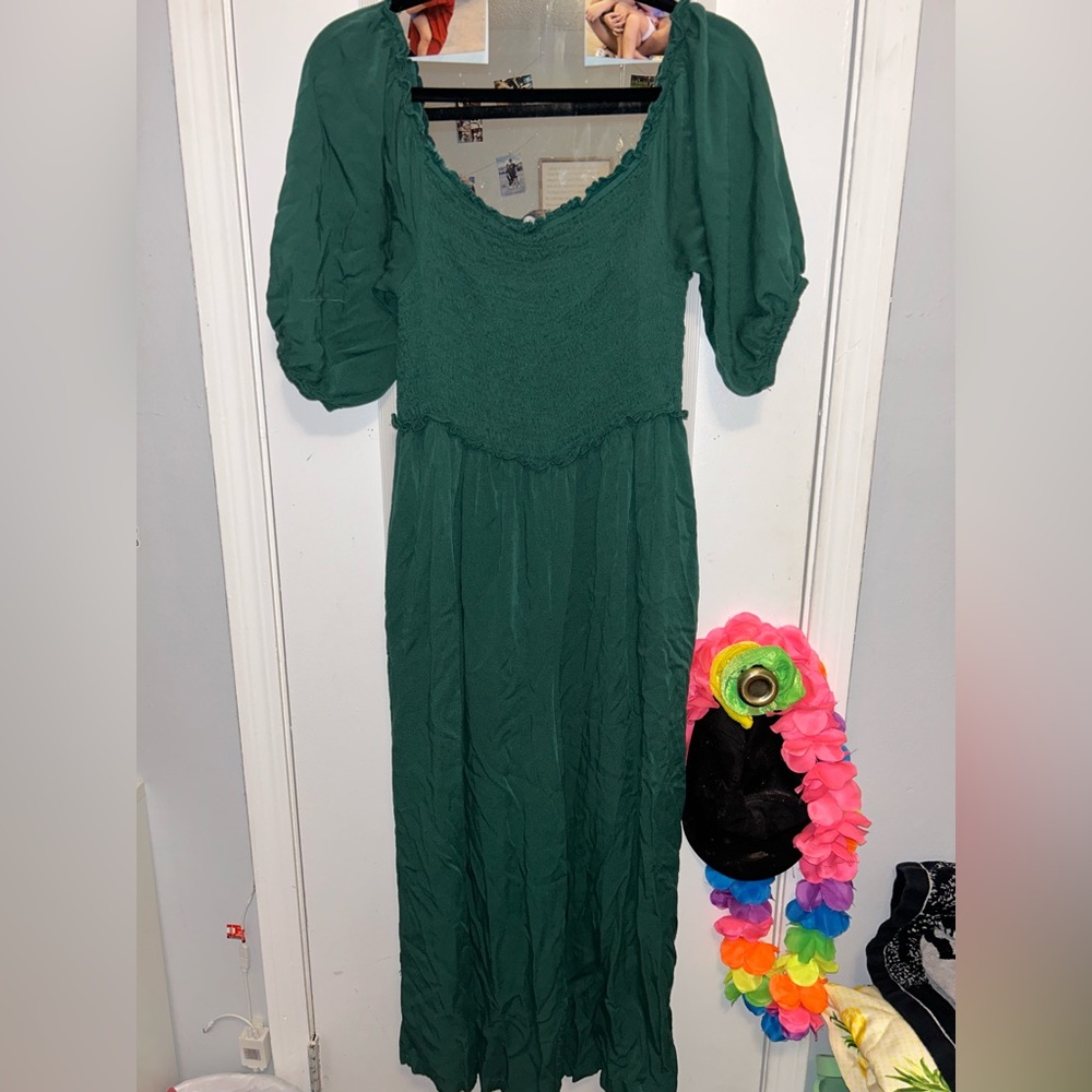a green jumper